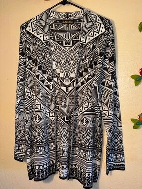 NWOT Ashley Blue open-front cardigan featuring a black and white bold g